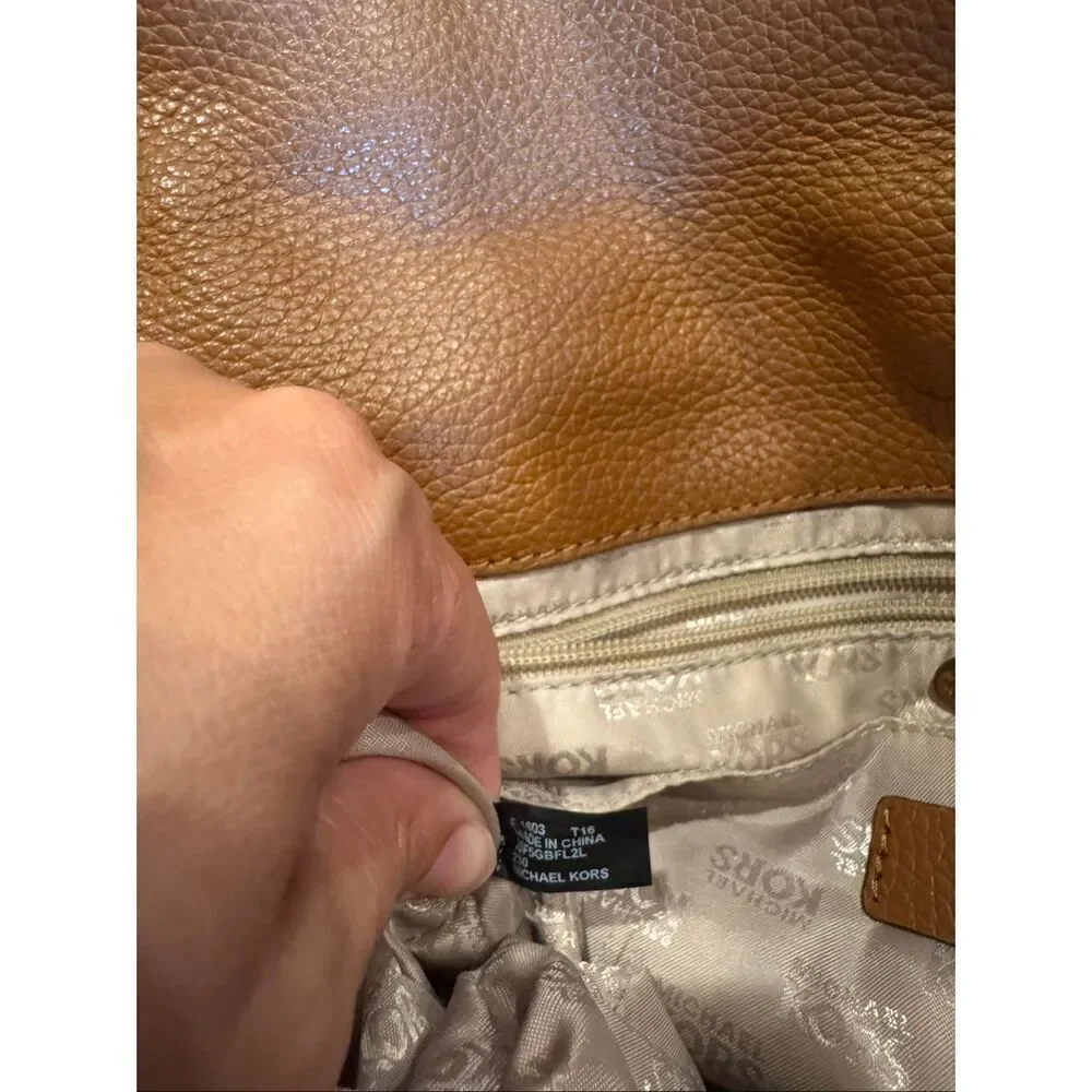 Woman’s Michael Kors, leather brown shoulder bag